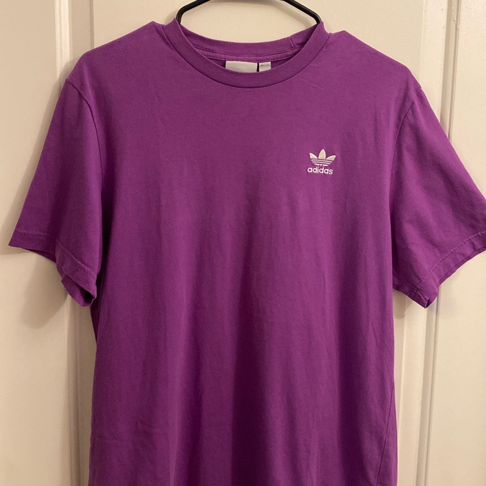 2 Adidas shirts. Good condition, purple and black. men’s M